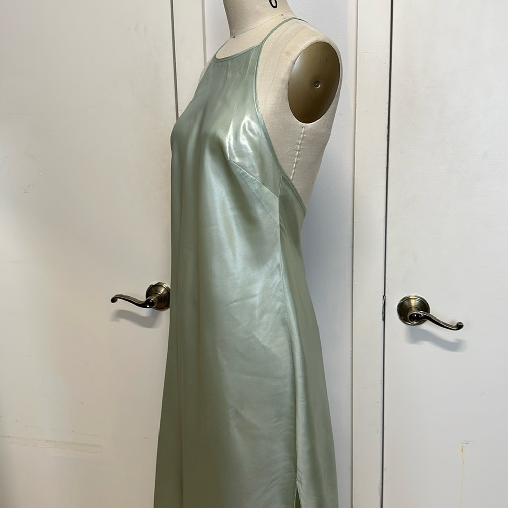 ✨Free People halter top satin in soft green with lace accent in the back